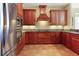 Well-equipped kitchen featuring wood cabinets and granite countertops at 11200 Hacienda Del Mar Blvd # 201, Placida, FL 33946