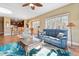 Open living area with a view of the kitchen and access to the balcony at 11200 Hacienda Del Mar Blvd # 201, Placida, FL 33946