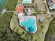 Relaxing kidney-shaped pool with surrounding lounge area at 11200 Hacienda Del Mar Blvd # 201, Placida, FL 33946