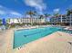 Refreshing community pool with lounge chairs at 11200 Hacienda Del Mar Blvd # 201, Placida, FL 33946