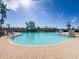 Resort-style pool with brick pavers and lush landscaping at 11200 Hacienda Del Mar Blvd # 201, Placida, FL 33946