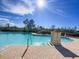 Relaxing kidney-shaped pool with fountain and brick deck at 11200 Hacienda Del Mar Blvd # 201, Placida, FL 33946