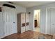 Bedroom with double door closet and access to bathroom at 13100 S Mccall Rd # 110, Port Charlotte, FL 33981