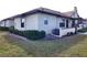 Single story home with AC unit and small manicured lawn at 13100 S Mccall Rd # 110, Port Charlotte, FL 33981
