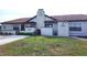 Two-unit building, featuring a well-maintained exterior and landscaping at 13100 S Mccall Rd # 110, Port Charlotte, FL 33981