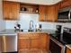 Well-equipped kitchen, granite counters, and wood cabinets at 13100 S Mccall Rd # 110, Port Charlotte, FL 33981