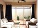 Relaxing sunroom with patio access and comfortable seating at 13100 S Mccall Rd # 110, Port Charlotte, FL 33981