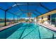 Refreshing screened pool with canal view, ideal for outdoor relaxation at 139 Rotonda Cir, Rotonda West, FL 33947