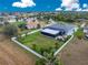 Aerial view showcasing the home's layout and backyard at 142 Island Ct, Rotonda West, FL 33947