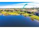 Aerial view of home and lake at 1506 Hyssop Loop, North Port, FL 34289
