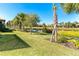 Enjoy water views from this peaceful backyard with lush landscaping at 1506 Hyssop Loop, North Port, FL 34289