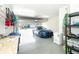 Two-car garage with additional storage and workshop area at 1506 Hyssop Loop, North Port, FL 34289