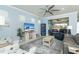 Spacious living room with sliding glass doors leading to a lanai at 1506 Hyssop Loop, North Port, FL 34289