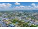 Wide aerial view of a waterfront community with many houses and canals at 15228 Chinook Way, Port Charlotte, FL 33981