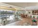 Open dining area with sliding glass doors leading to the pool and patio at 15228 Chinook Way, Port Charlotte, FL 33981