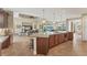 Open kitchen showcasing a large island and views into the living area at 15228 Chinook Way, Port Charlotte, FL 33981