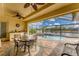 Relaxing pool and patio area overlooking a canal at 15228 Chinook Way, Port Charlotte, FL 33981