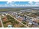 Property overview showing a house near a canal and other waterfront properties at 15626 Meacham Cir, Port Charlotte, FL 33981