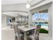 Casual breakfast nook with a rustic table and chairs at 15626 Meacham Cir, Port Charlotte, FL 33981