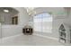 Charming dining area featuring a decorative chandelier and window at 15626 Meacham Cir, Port Charlotte, FL 33981