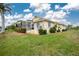 Single-story house with a well-maintained lawn at 15626 Meacham Cir, Port Charlotte, FL 33981