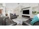 Relaxing living room featuring a fireplace and comfortable seating at 15626 Meacham Cir, Port Charlotte, FL 33981