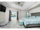 Main bedroom with pool access and king-size bed at 15626 Meacham Cir, Port Charlotte, FL 33981