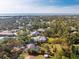 Aerial view of home, pool, and large lot at 1651 Maria St, Englewood, FL 34223