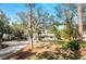 Single-story home with mature landscaping at 1651 Maria St, Englewood, FL 34223