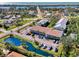 Aerial view showcasing condo complex and surrounding area at 1730 Manasota Beach Rd # 110, Englewood, FL 34223