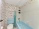 Light blue bathroom with shower/tub combo at 1730 Manasota Beach Rd # 110, Englewood, FL 34223