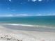 Scenic beach view with tranquil water and white sand at 1730 Manasota Beach Rd # 110, Englewood, FL 34223