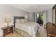 Comfortable bedroom with private access to balcony at 1730 Manasota Beach Rd # 110, Englewood, FL 34223