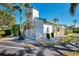 Building exterior with landscaping and a walkway at 1730 Manasota Beach Rd # 110, Englewood, FL 34223