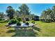 Attractive landscaping with mature palm trees at 1730 Manasota Beach Rd # 110, Englewood, FL 34223