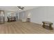 Open living room with views into dining area at 1730 Manasota Beach Rd # 110, Englewood, FL 34223