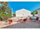 Inviting pool area with patio furniture and umbrellas at 1730 Manasota Beach Rd # 110, Englewood, FL 34223