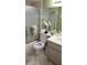 Clean bathroom with shower/tub combo, toilet and double vanity at 1760 Gulf Blvd # 511, Englewood, FL 34223