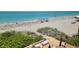 Private deck overlooking the beach with lounge chairs at 1760 Gulf Blvd # 511, Englewood, FL 34223