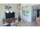 Bright dining area with spiral staircase and ocean views at 1760 Gulf Blvd # 511, Englewood, FL 34223