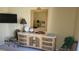 Wooden dresser with mirror and ample storage space at 1760 Gulf Blvd # 511, Englewood, FL 34223