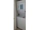Stackable washer and dryer in convenient laundry closet at 1760 Gulf Blvd # 511, Englewood, FL 34223