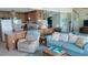 Living area with kitchen, recliner and sofa at 1760 Gulf Blvd # 511, Englewood, FL 34223