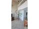 Elegant spiral staircase leading to upper loft level at 1760 Gulf Blvd # 511, Englewood, FL 34223