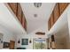 Bathroom with high ceilings and wooden cabinets at 185 Rotonda E Blvd, Rotonda West, FL 33947