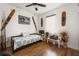 Bedroom with daybed, wood floors, and water skis at 185 Rotonda E Blvd, Rotonda West, FL 33947