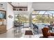 Breakfast nook with sliding glass doors leading to a pool at 185 Rotonda E Blvd, Rotonda West, FL 33947