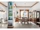 Formal dining room with wood table and chairs, and built-in hutch at 185 Rotonda E Blvd, Rotonda West, FL 33947