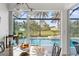 Kitchen with pool view through large sliding glass doors at 185 Rotonda E Blvd, Rotonda West, FL 33947