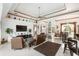 Open concept living area with a view of the kitchen and dining room at 185 Rotonda E Blvd, Rotonda West, FL 33947